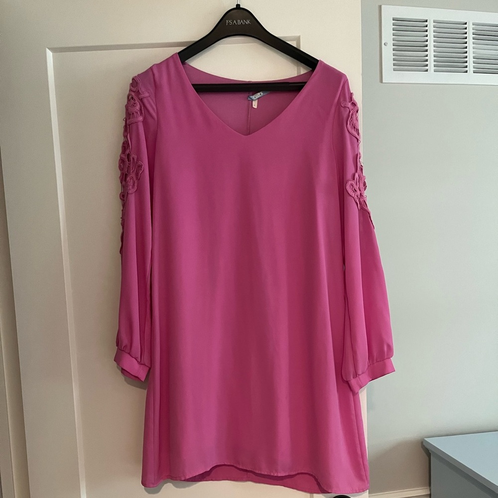 Long sleeve pink dress.